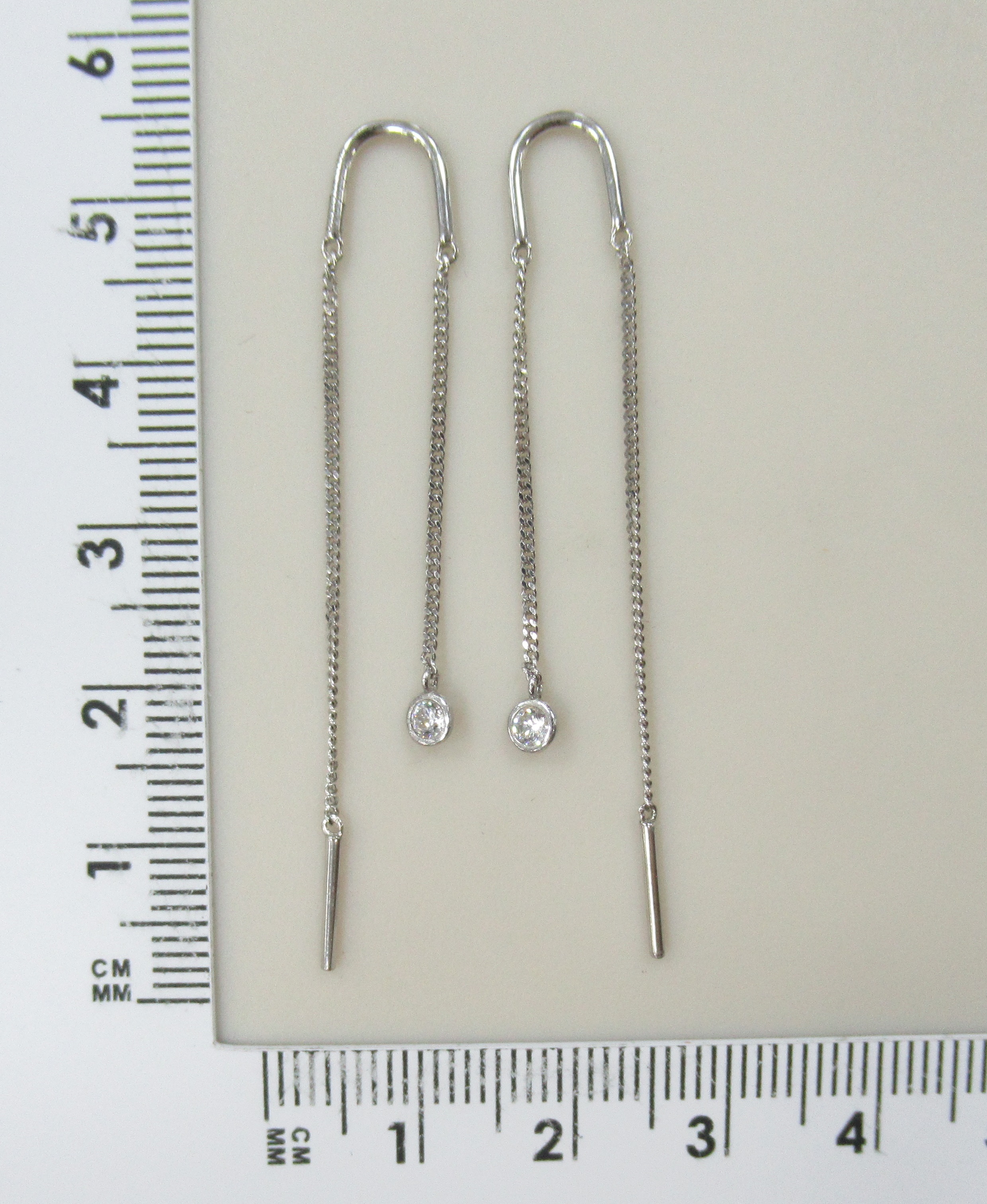 Серебряные серьги-протяжки с фианитами